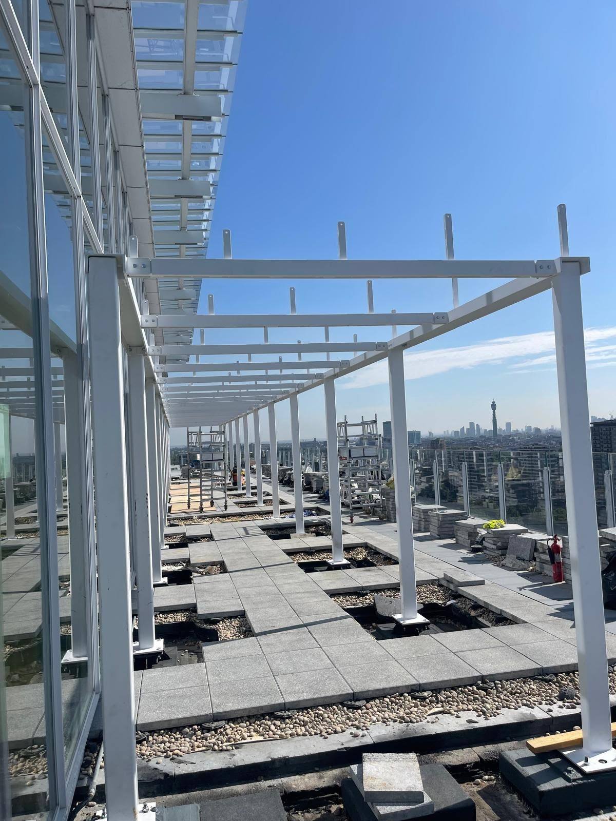 Rooftop terrace glazing and pergola joints sealed during fit-out
