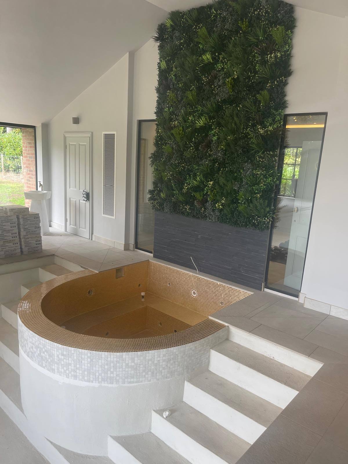 Luxury hot tub under construction before sealant application